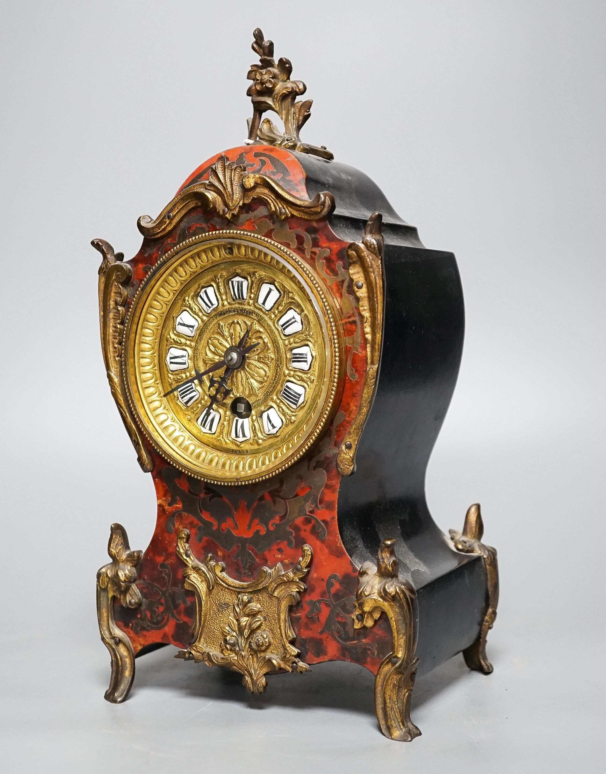 A 19th century French scarlet boullework mantel clock 30cm